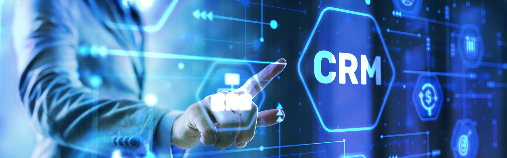 a person in a suit taps on the word CRM