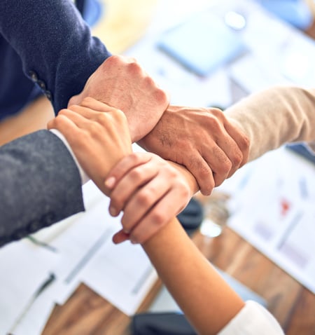 Partners are strong together: symbolic image of clasped hands
